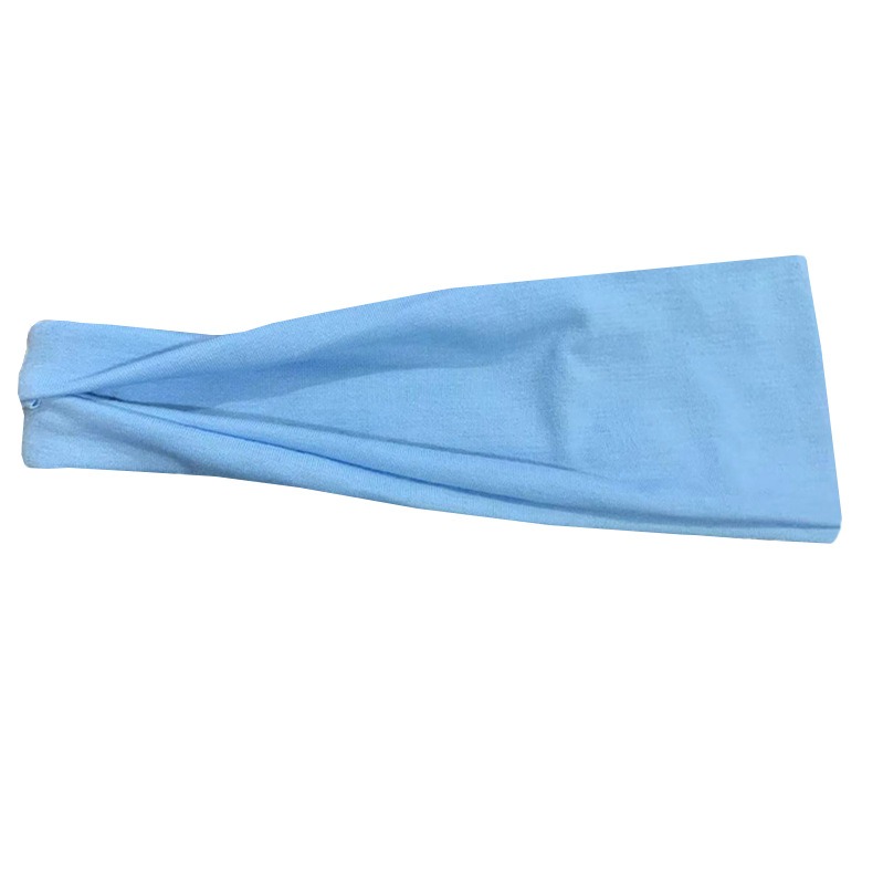 Sky blue headband showing broad tapered fabric coverage