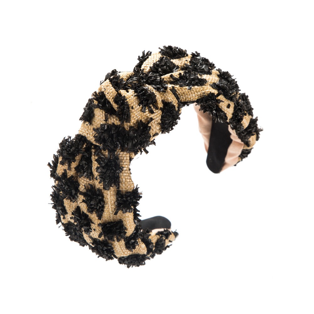 Padded lining inside black beige headband