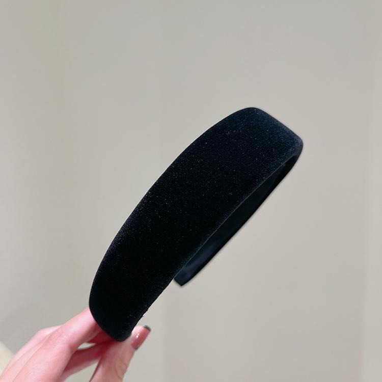 Black velvet headband revealing smooth dark inner band