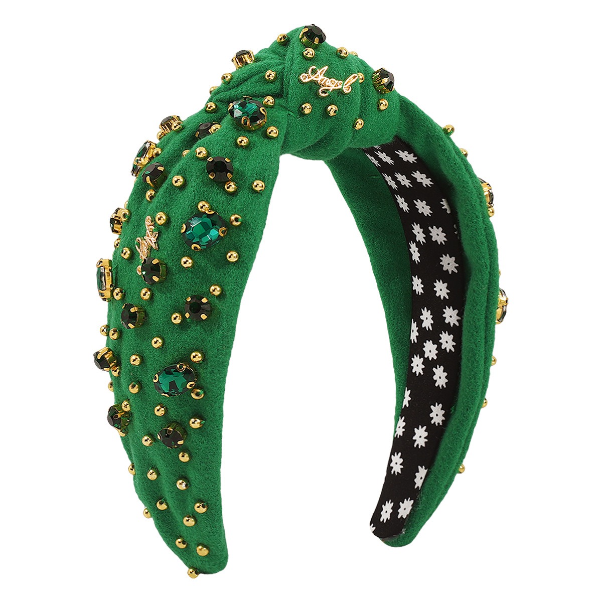 Emerald green headband showing ornate inner lining