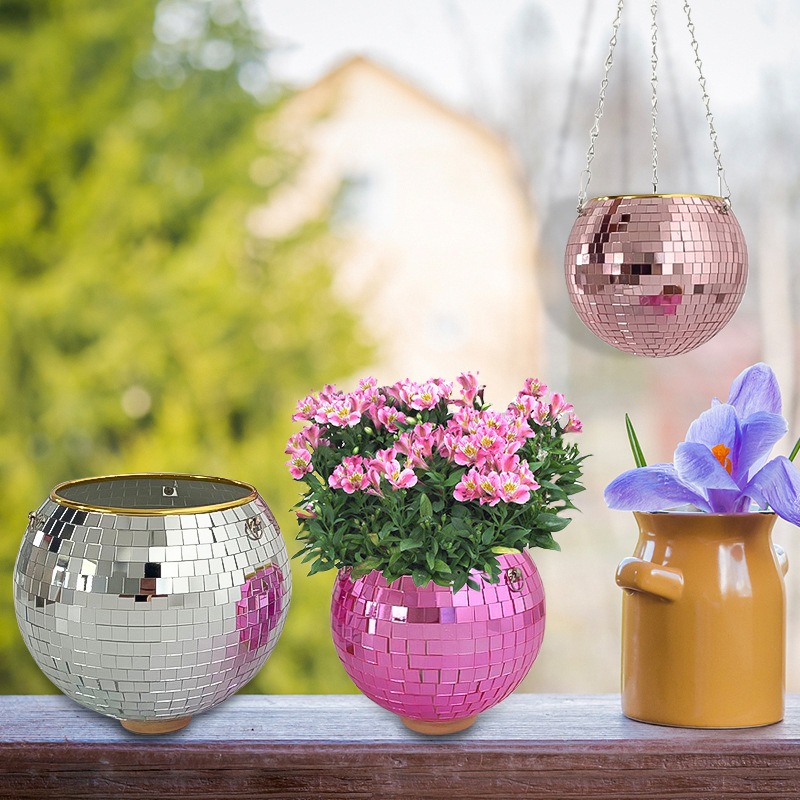 Mirror-tile hanging ball planter with chains in a bright room
