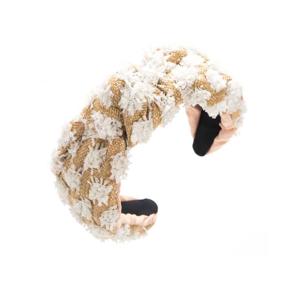 Cream wide headband showing structured edge