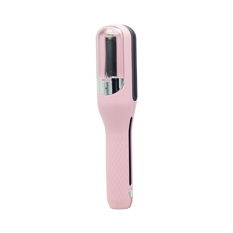 Close view of a pink split end trimmer with its cutting head