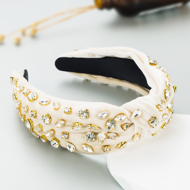 Ivory velvet headband showing padded gathered construction