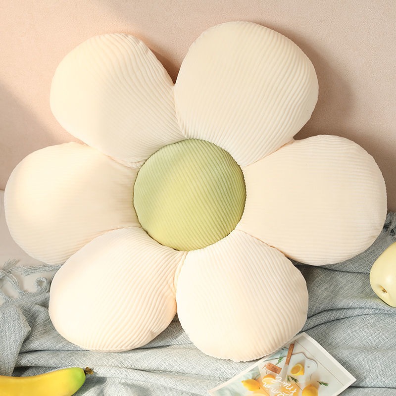 Flower-shaped cushion placed on a chair in a dorm corner