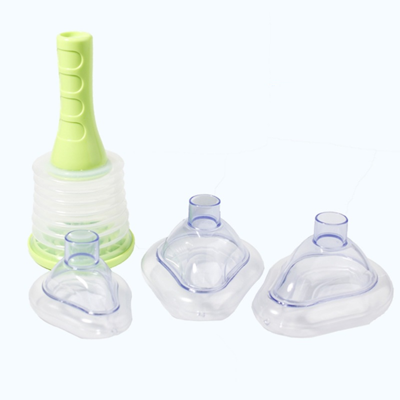 Complete respiratory device set with lime-green pump and three clear silicone masks