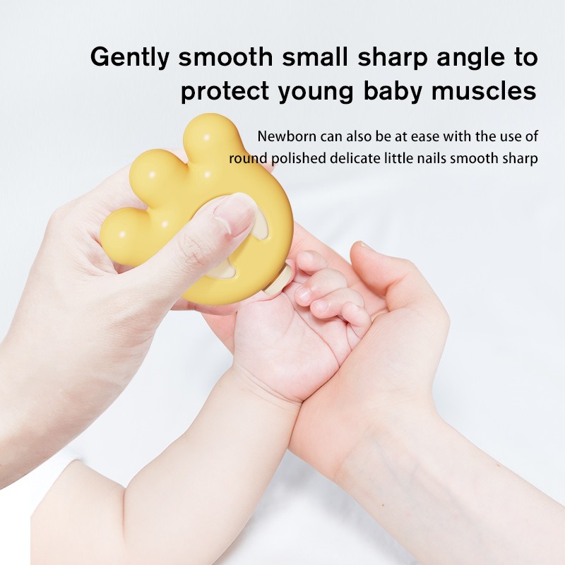 Handheld grinder smoothing a small baby nail