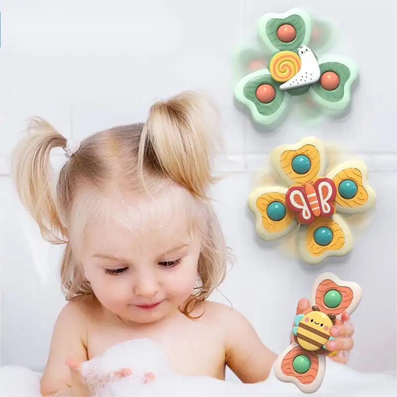 Rounded colorful spinner toy shapes in toddler bath