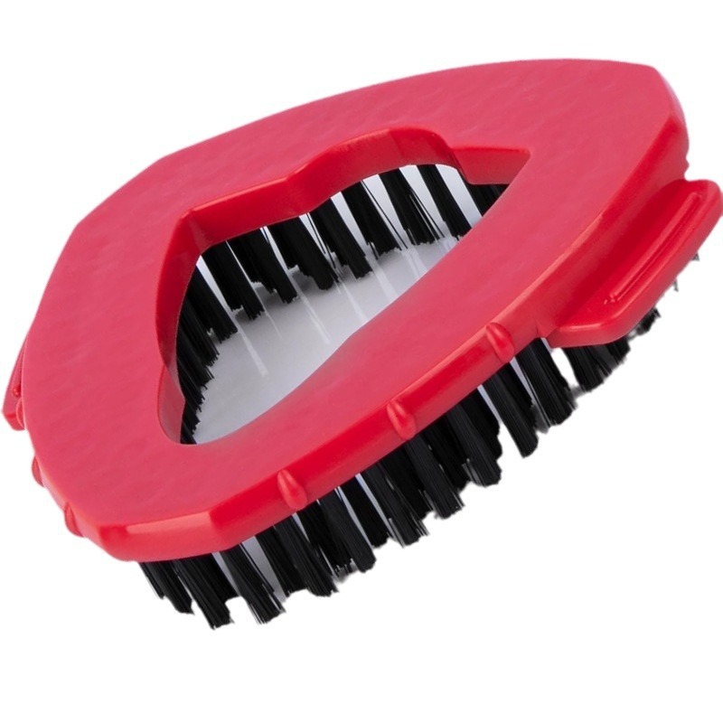Close-up of triangular profile and dense black bristles