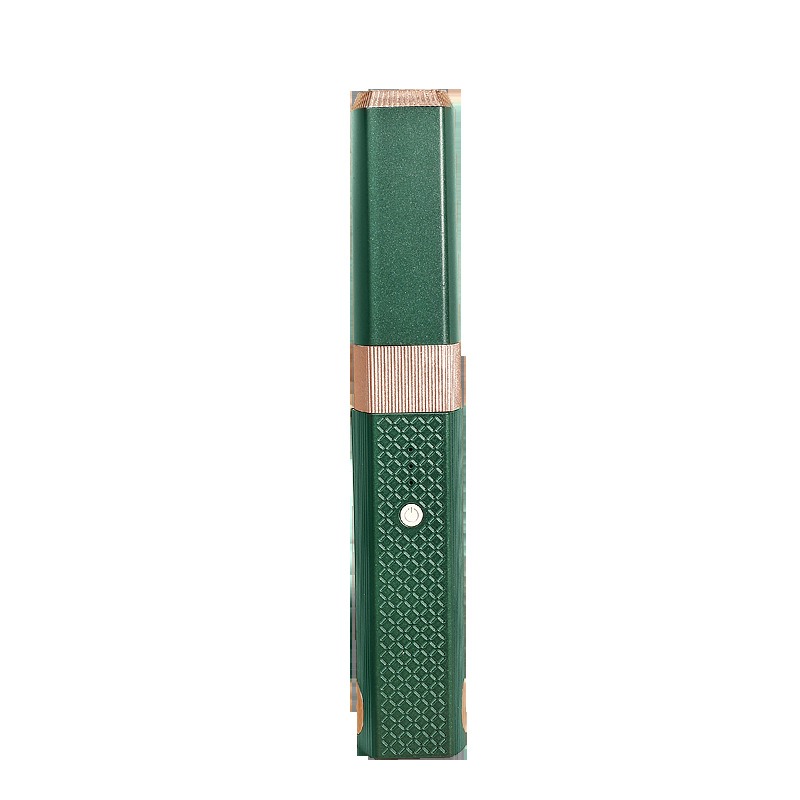 Dark green wireless styling stick with rose-gold trim