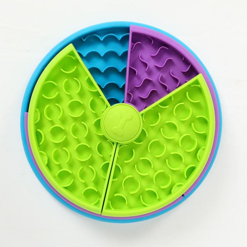 Textured compartments spread food across colorful feeder
