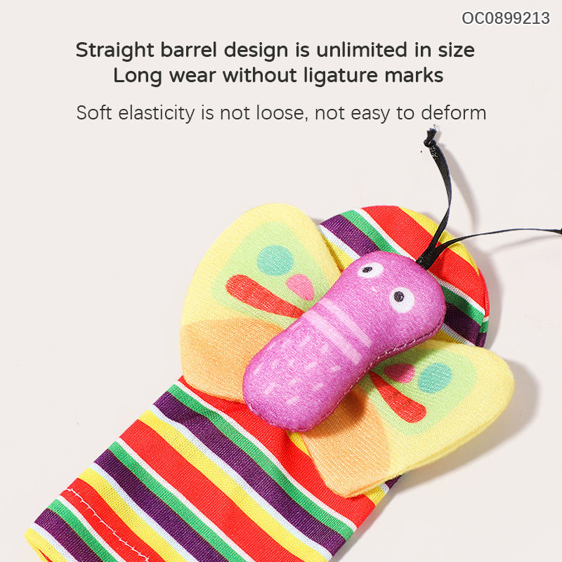 Colorful butterfly rattle with layered fabric details