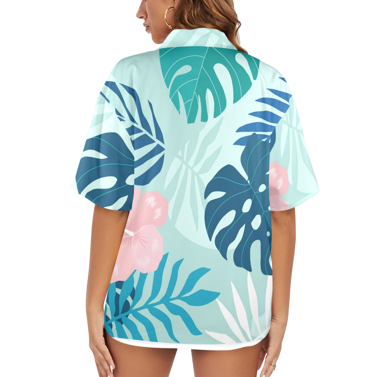 Women's Hawaiian shirt with tropical leaf print, short sleeves, made in USA, perfect for work or leisure.