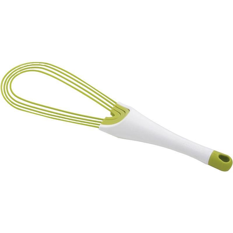 White and lime-green egg beater beside mixing bowl