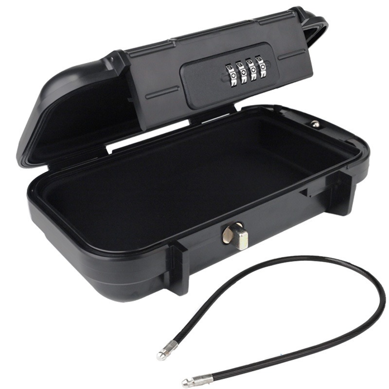 Open black valuables box showing foam-lined interior and combination lid