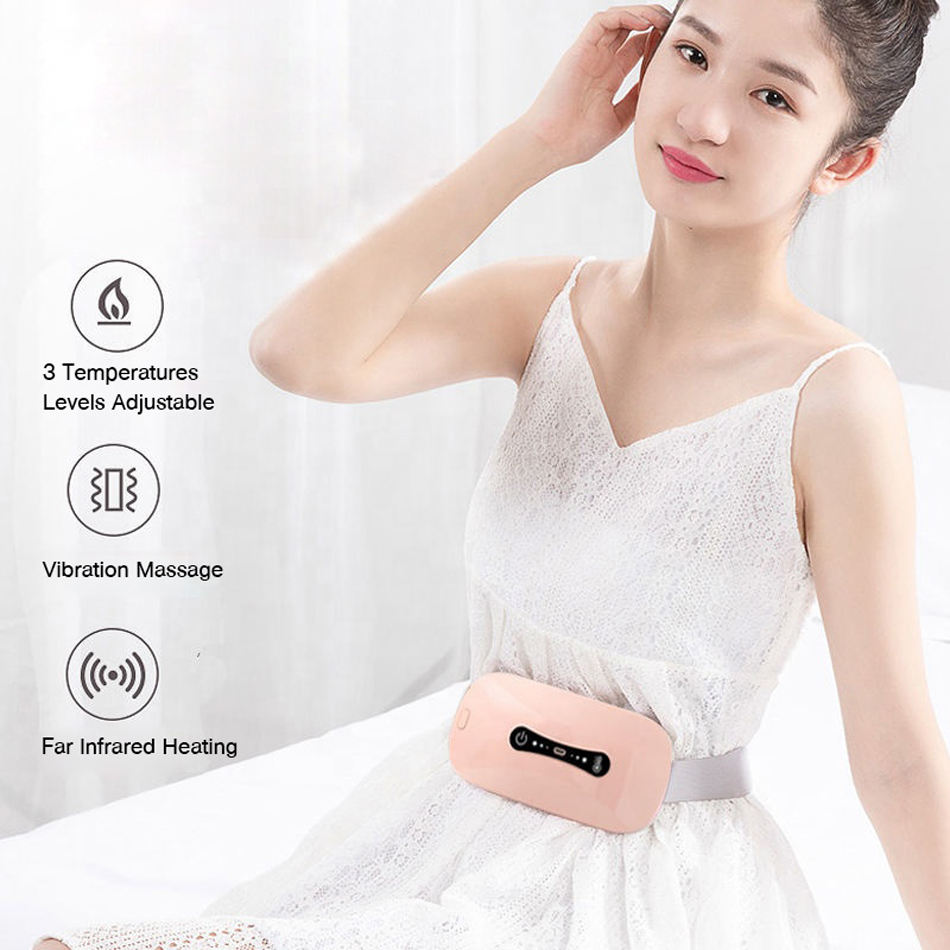 Woman wearing the belt while seated, with three feature icons for temperature levels, vibration massage, and far-infrared heat