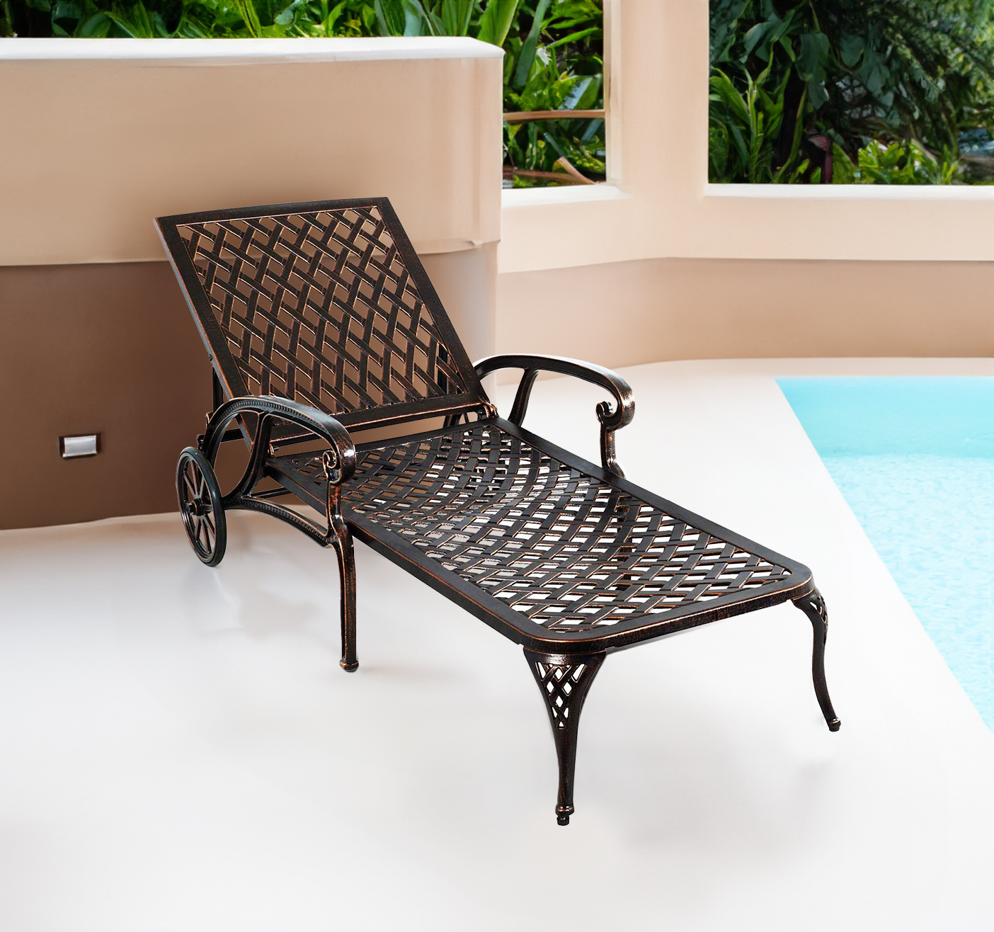 Brown cast aluminium lounger on a sunny deck beside the pool