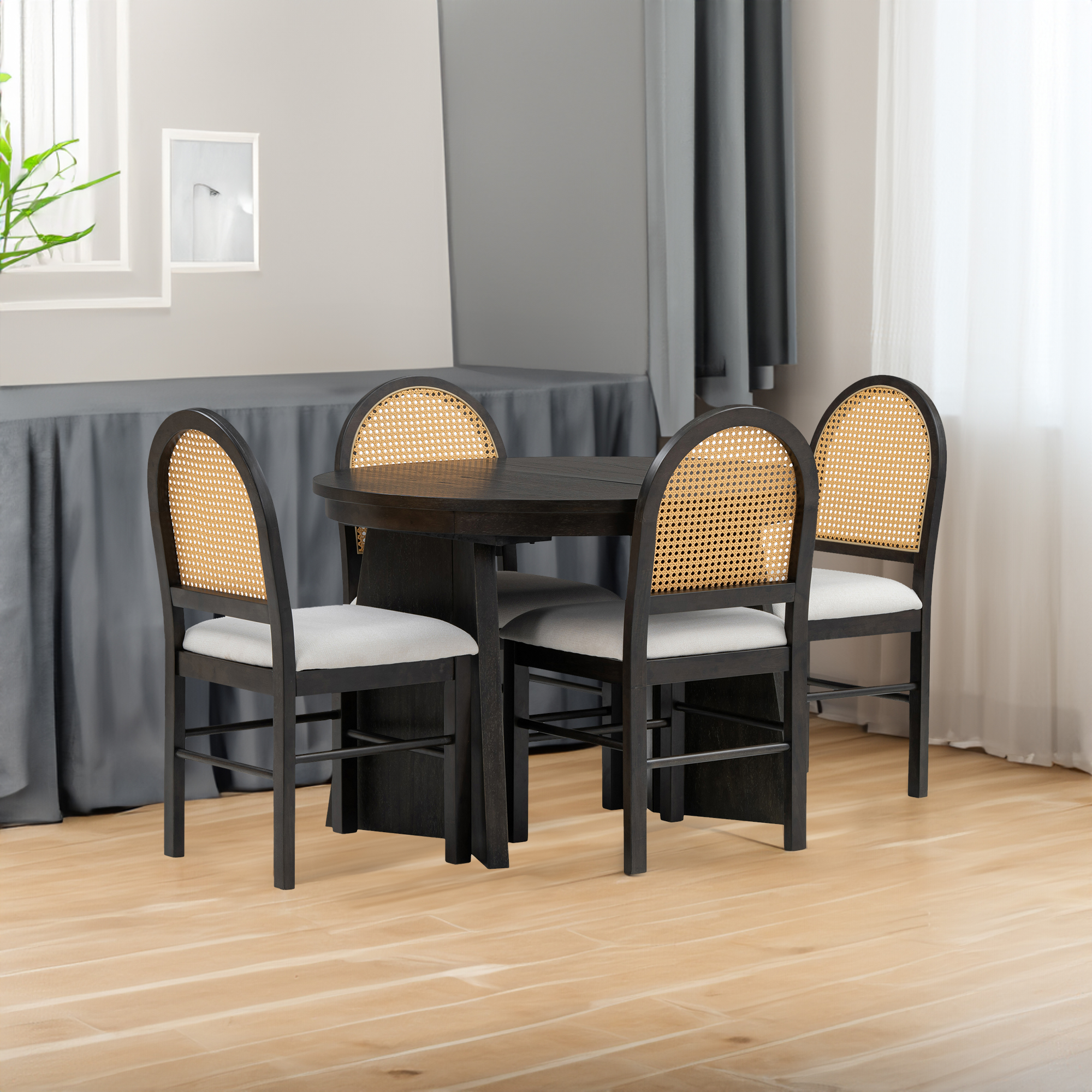 Round dining set styled in a bright small dining room