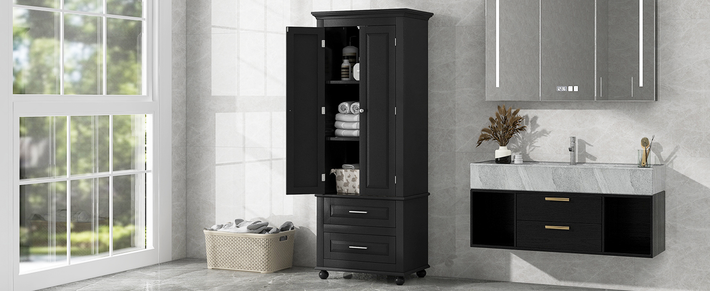 Black tall bathroom cabinet beside floating vanity with laundry basket