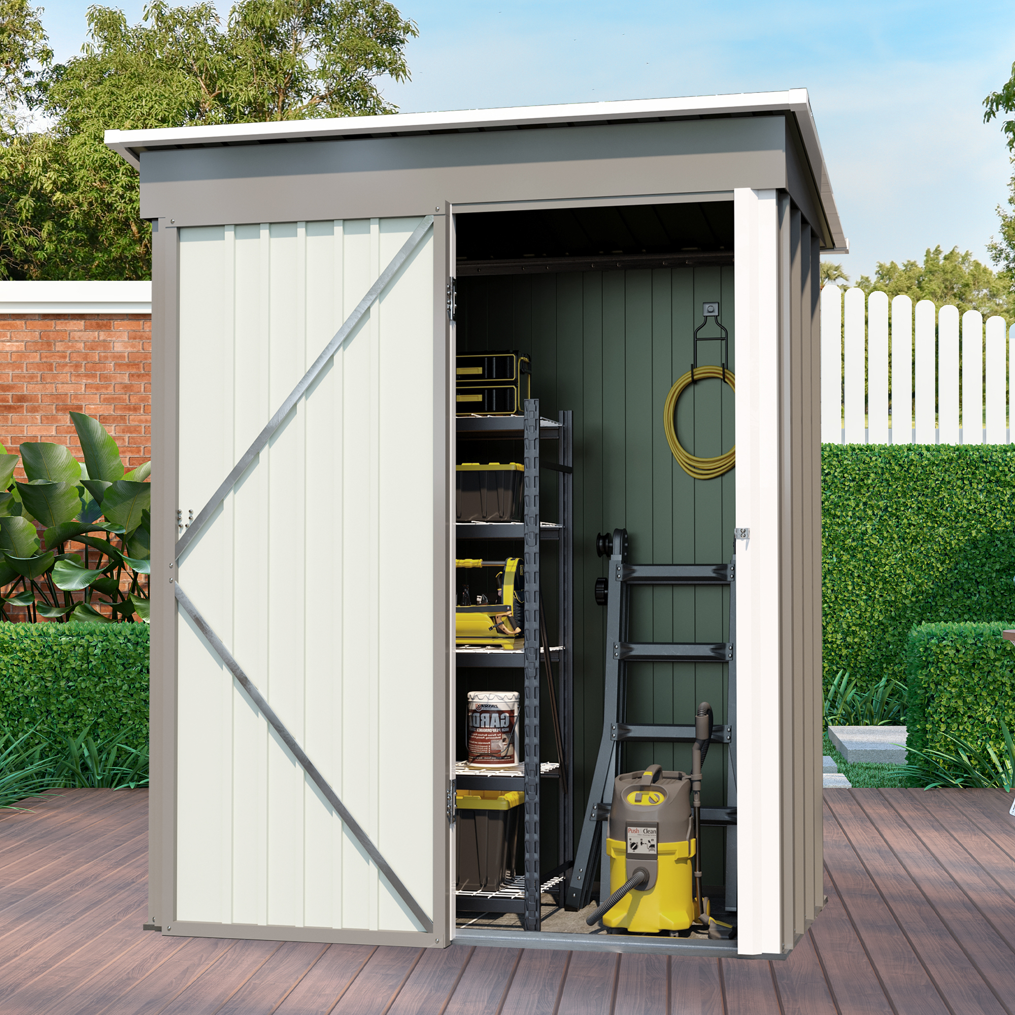 Metal garden shed installed on a tidy backyard lawn