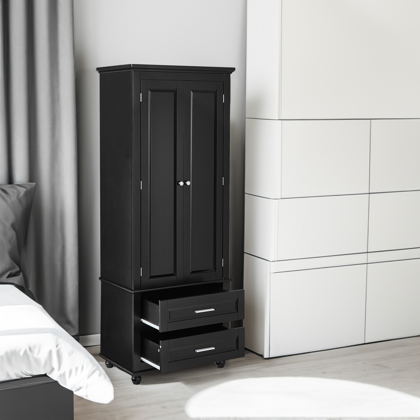Black cabinet in a modern bedroom with one drawer open
