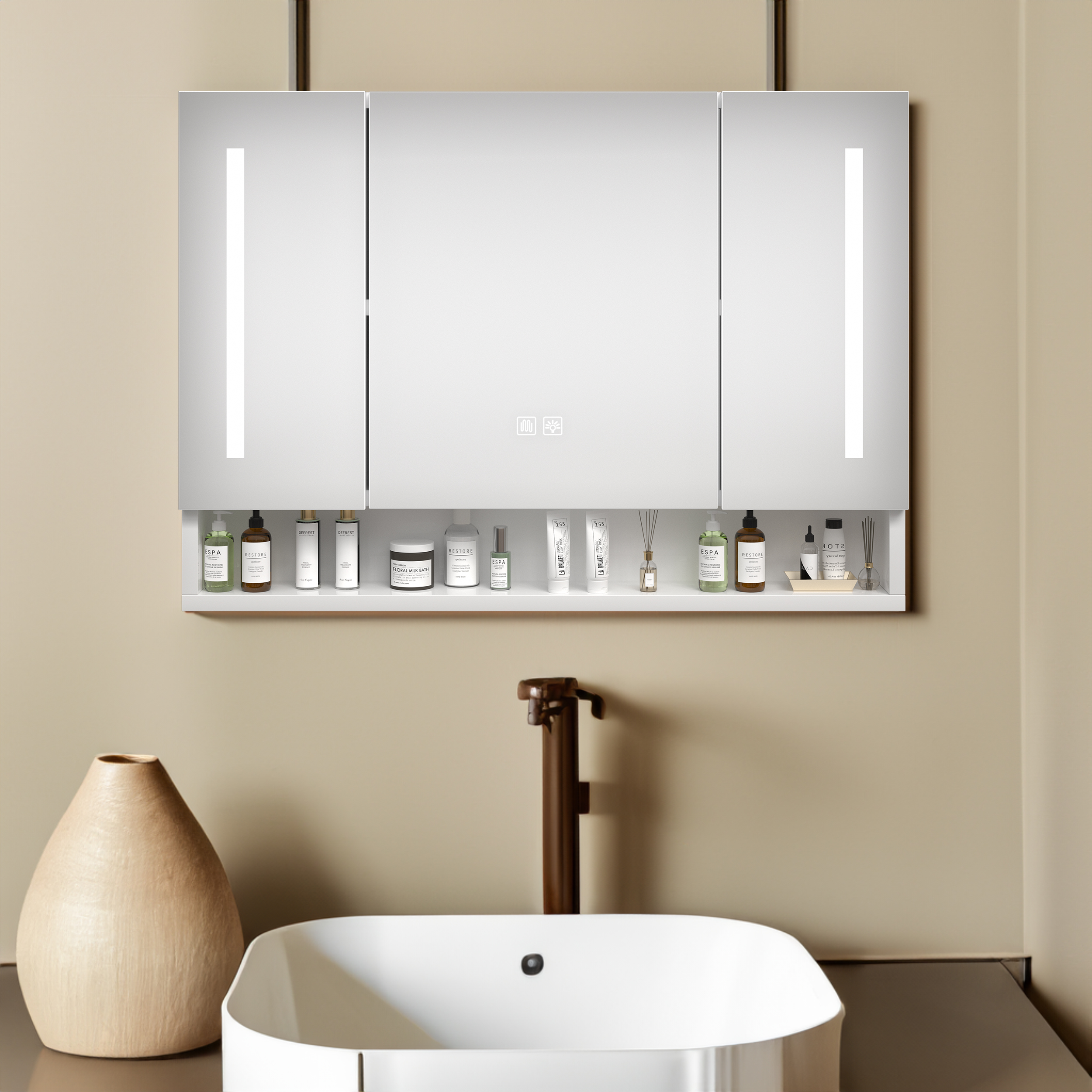 Installed mirror cabinet with toiletries on the open lower shelf