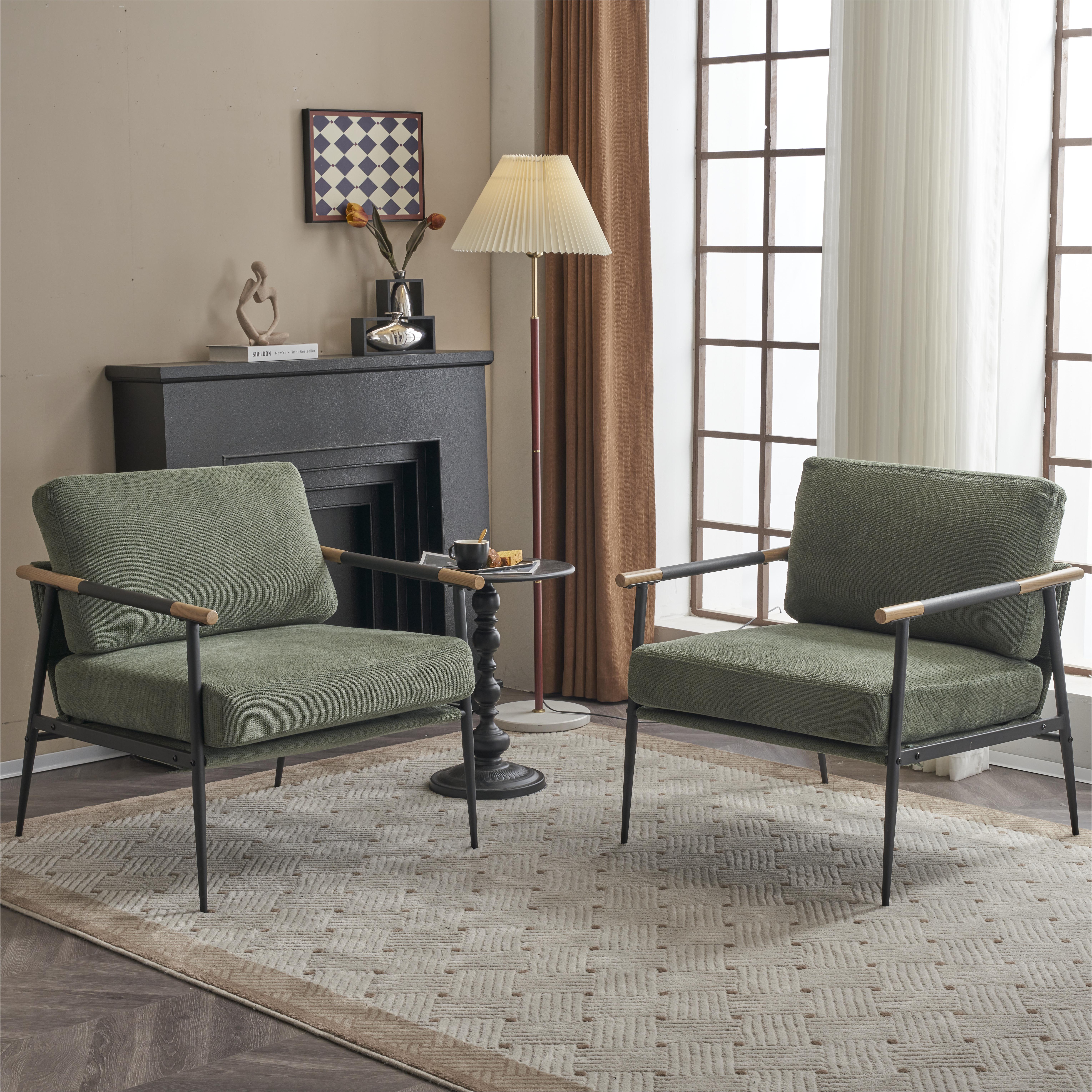 Armchair with tapered black metal legs in a living room