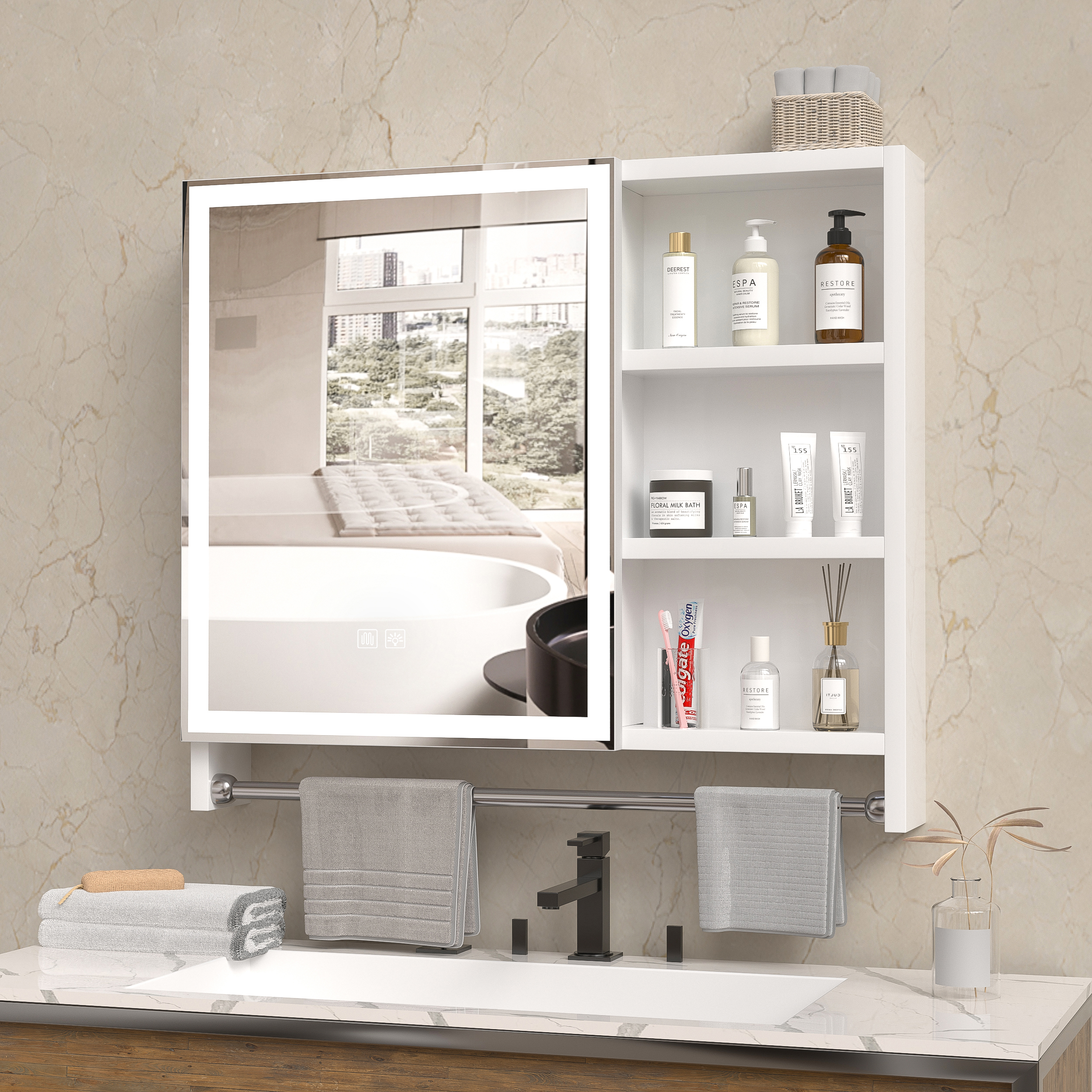 Mirror cabinet with toiletries on shelves and towels on chrome bar