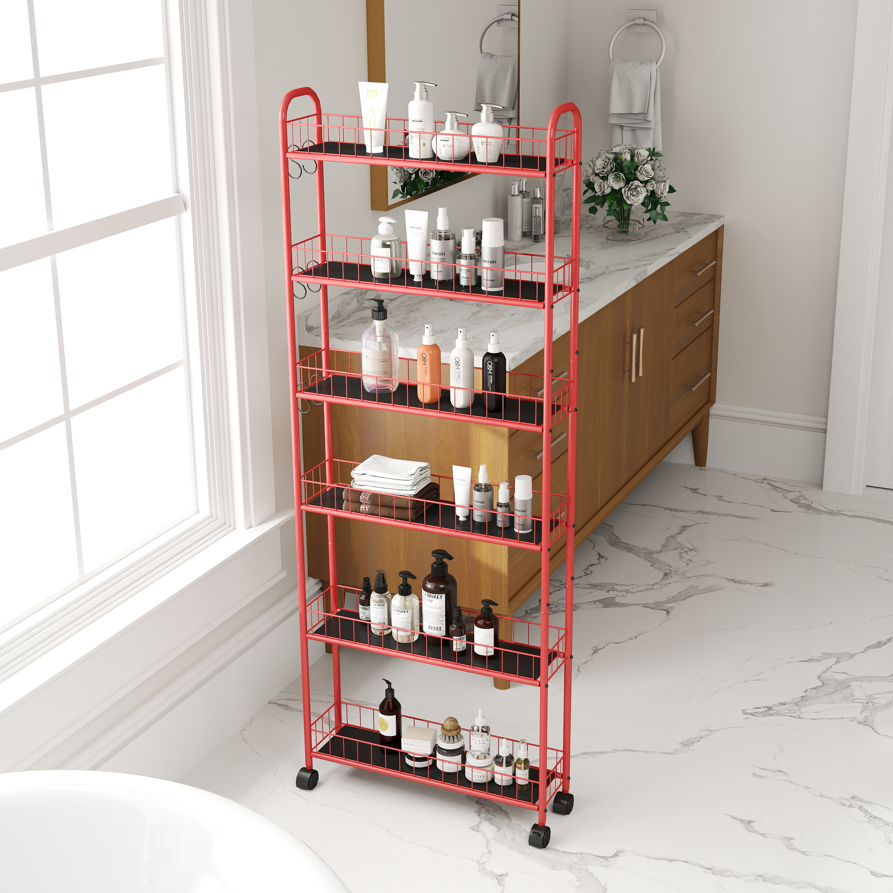 Angled view of red rolling cart with black liner trays in a bathroom