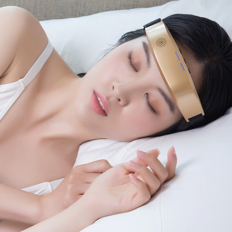 Woman peacefully asleep in soft morning light after using the EMS sleep headband