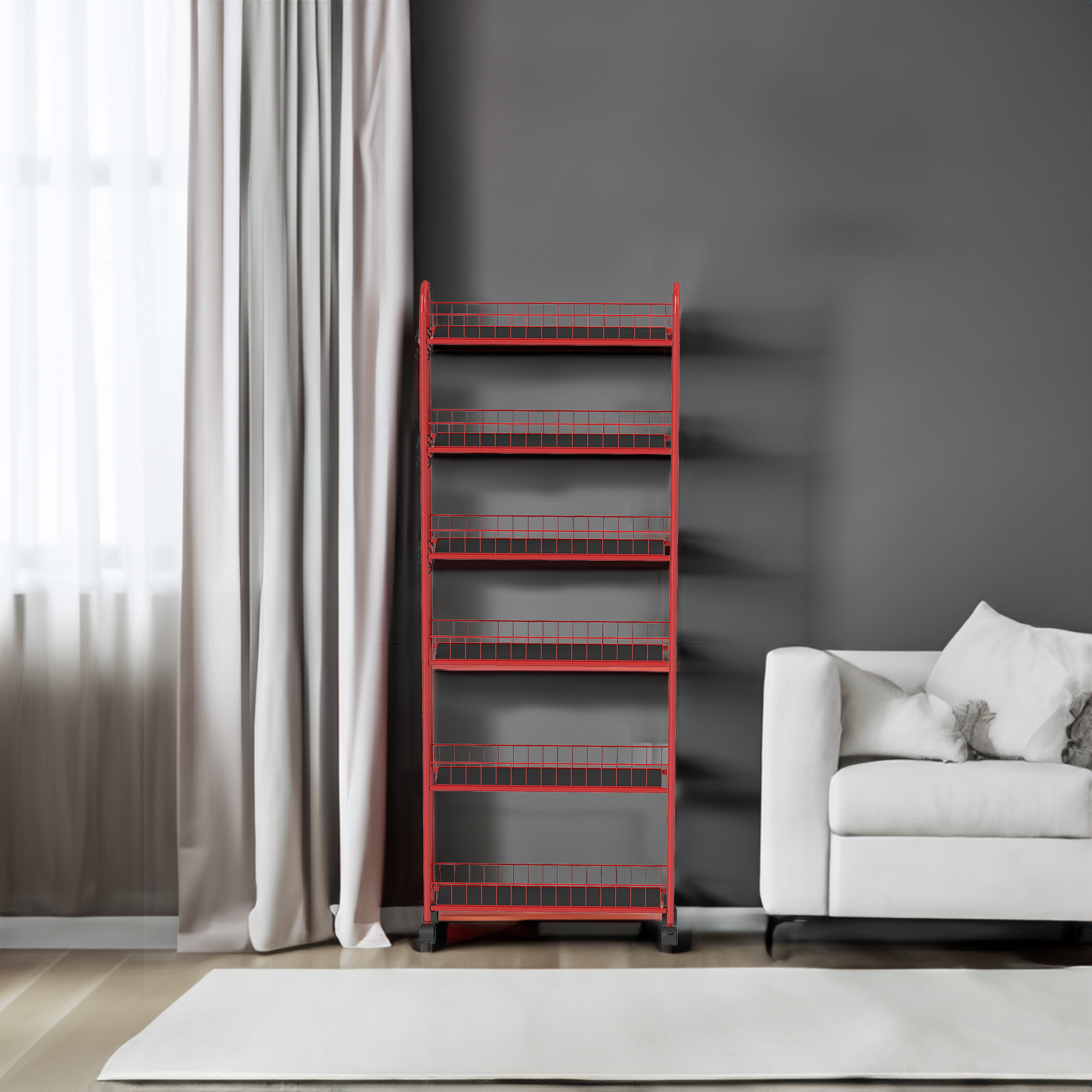 Slim red rolling cart standing against a wall in a living room