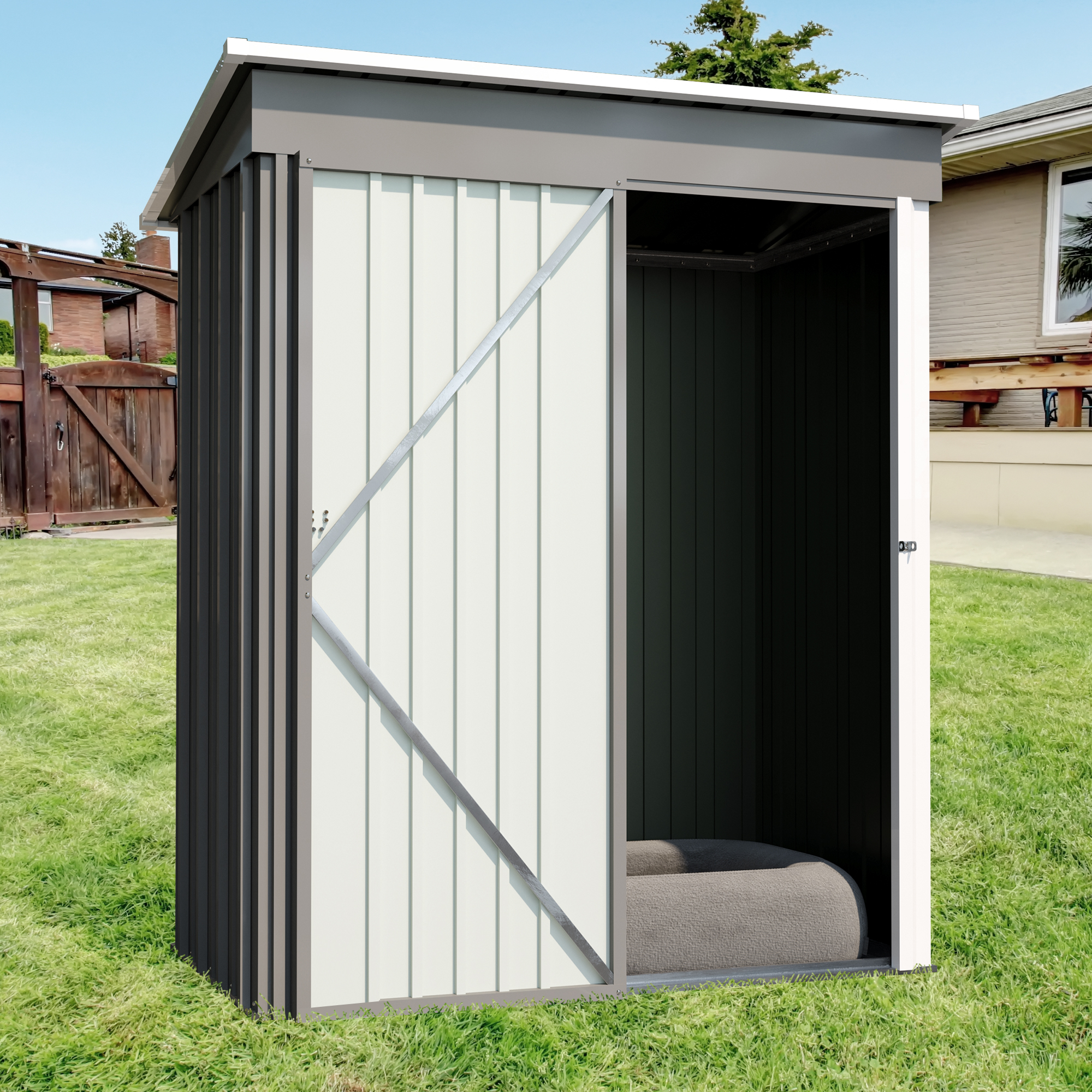 Tidy backyard with the gray shed closed and the patio clear