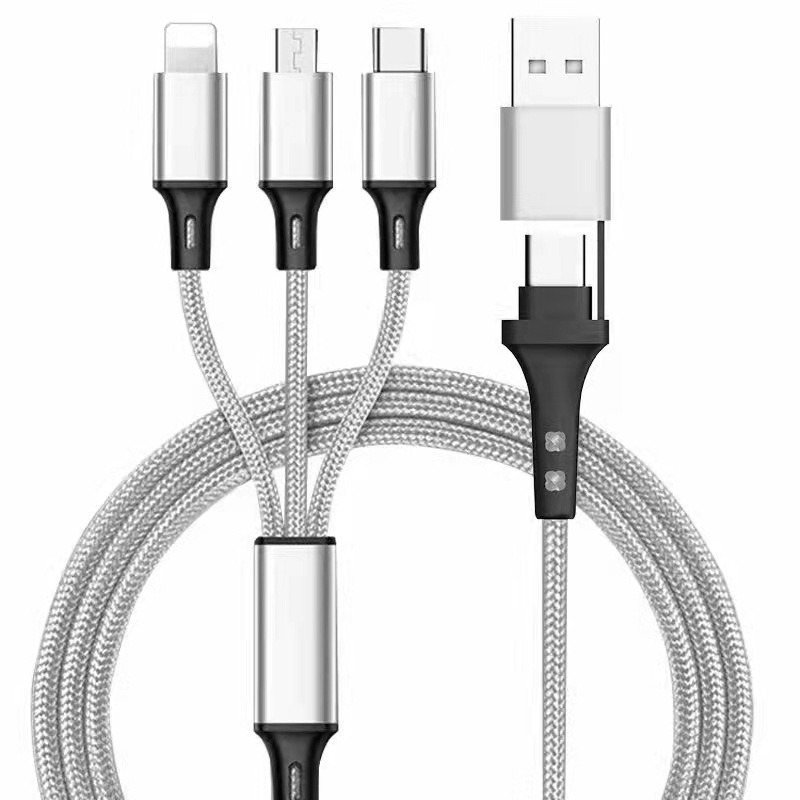 Close-up of silver metal connector housings on a braided charging cable