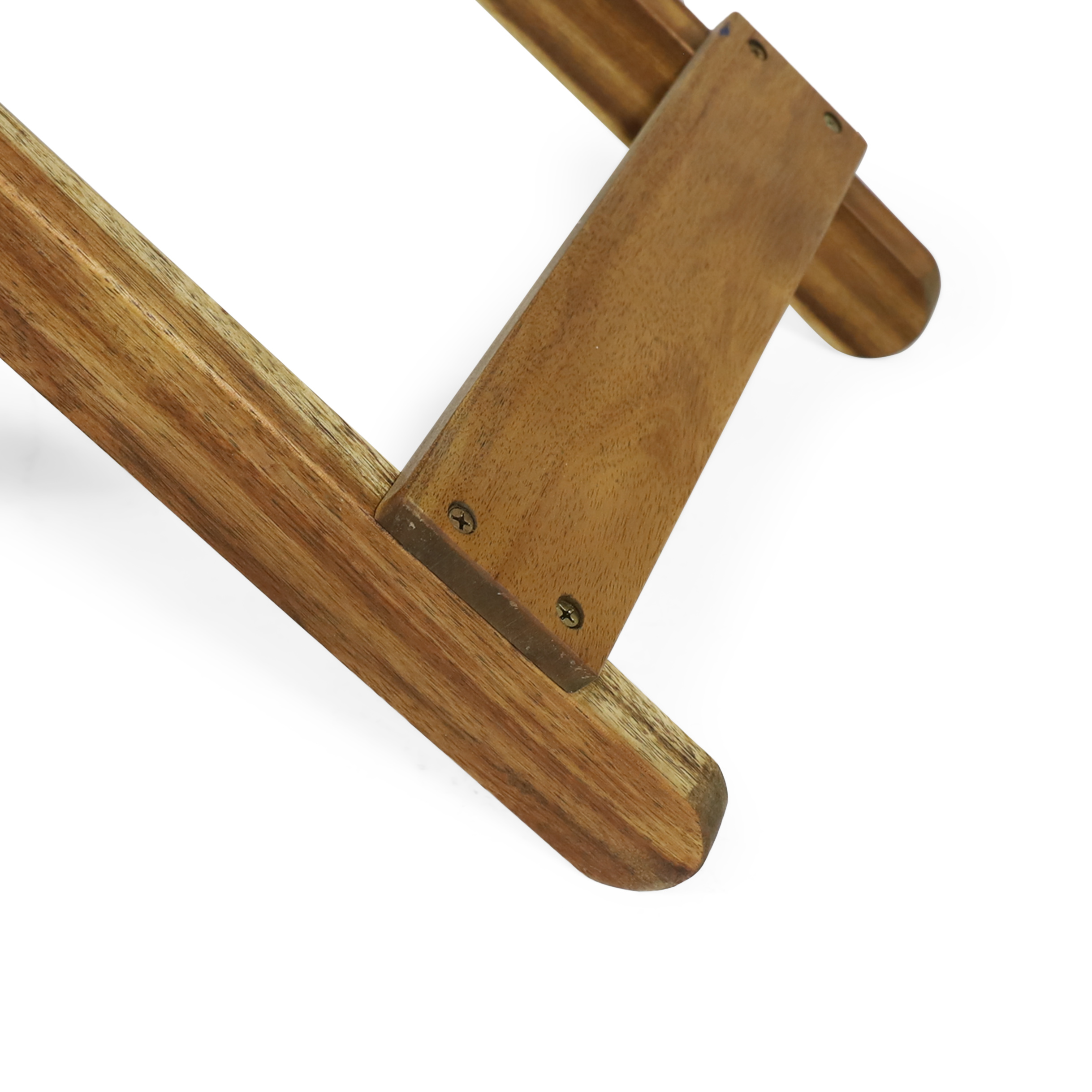 Close-up of table leg foot rest and screw on natural wood