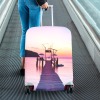 Luggage cover (26-28") with pier design, dust-resistant and elastic, ideal for travel.