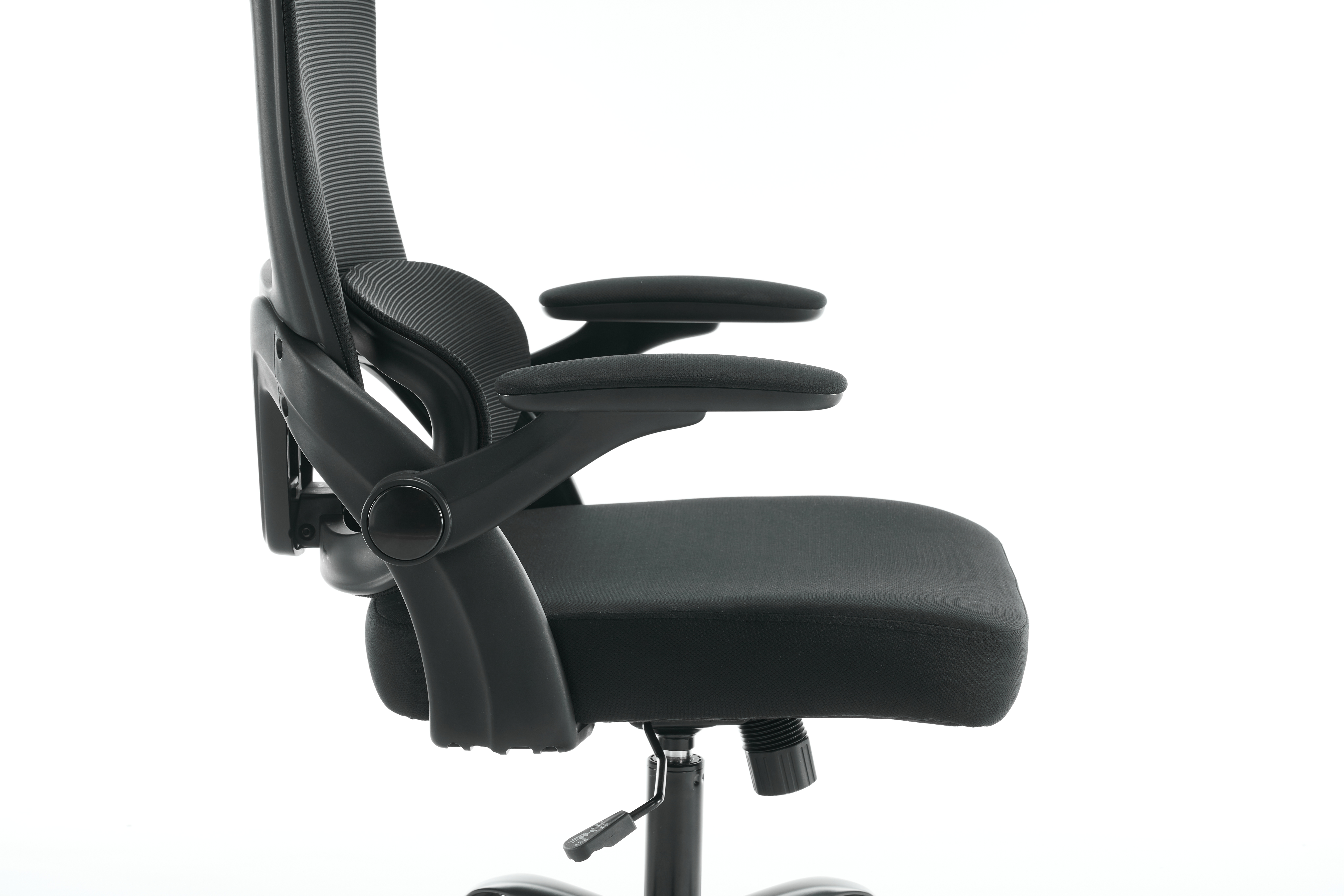 Close-up of flip-up armrest, padded seat and height lever on black chair