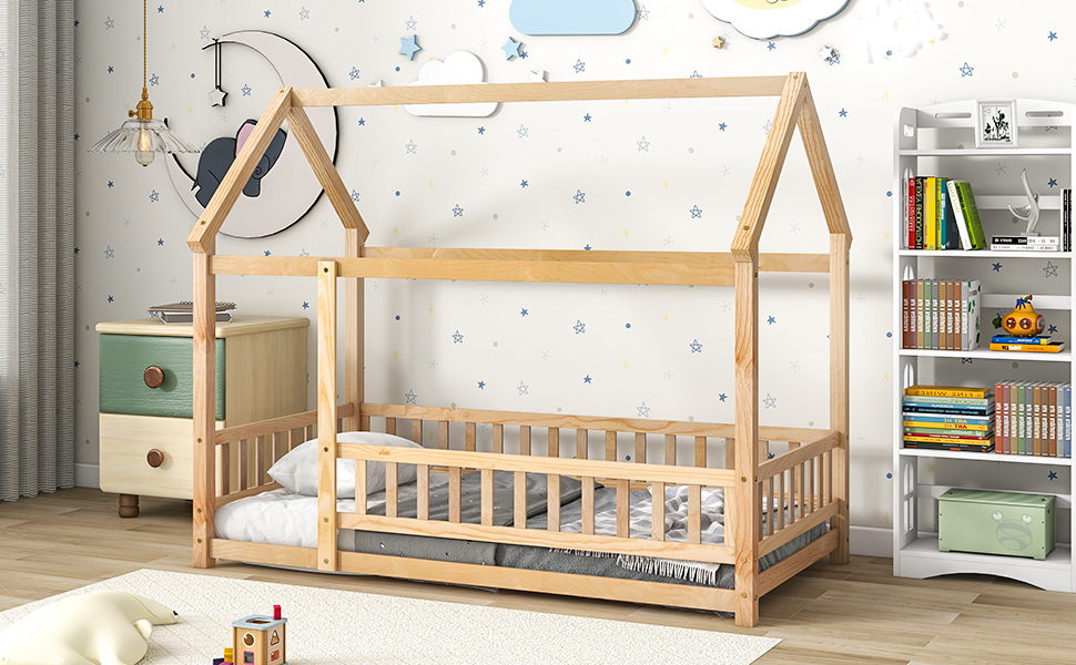 Front view of pine house bed with guardrails and fence in a kids bedroom
