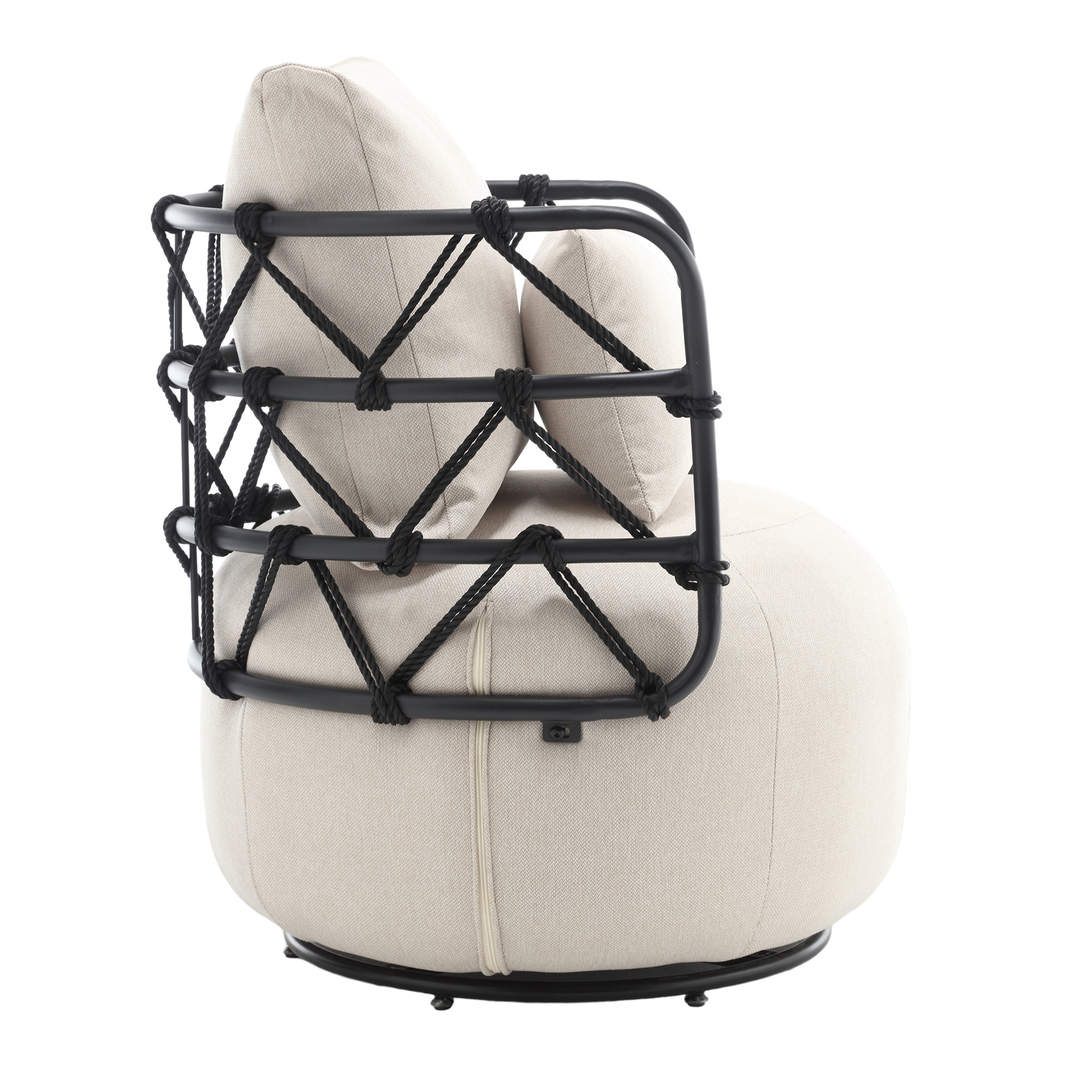 Cream tufted accent chair placed in a styled living room corner