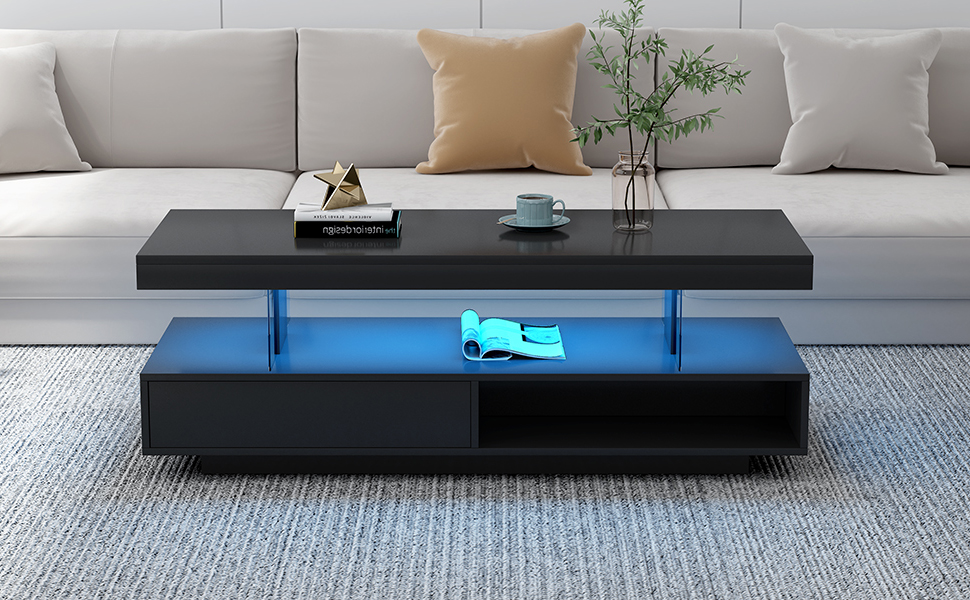 Coffee table with open lower cubby and drawer area in a living room