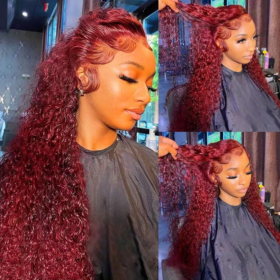 Close view of burgundy curls being lifted for styling