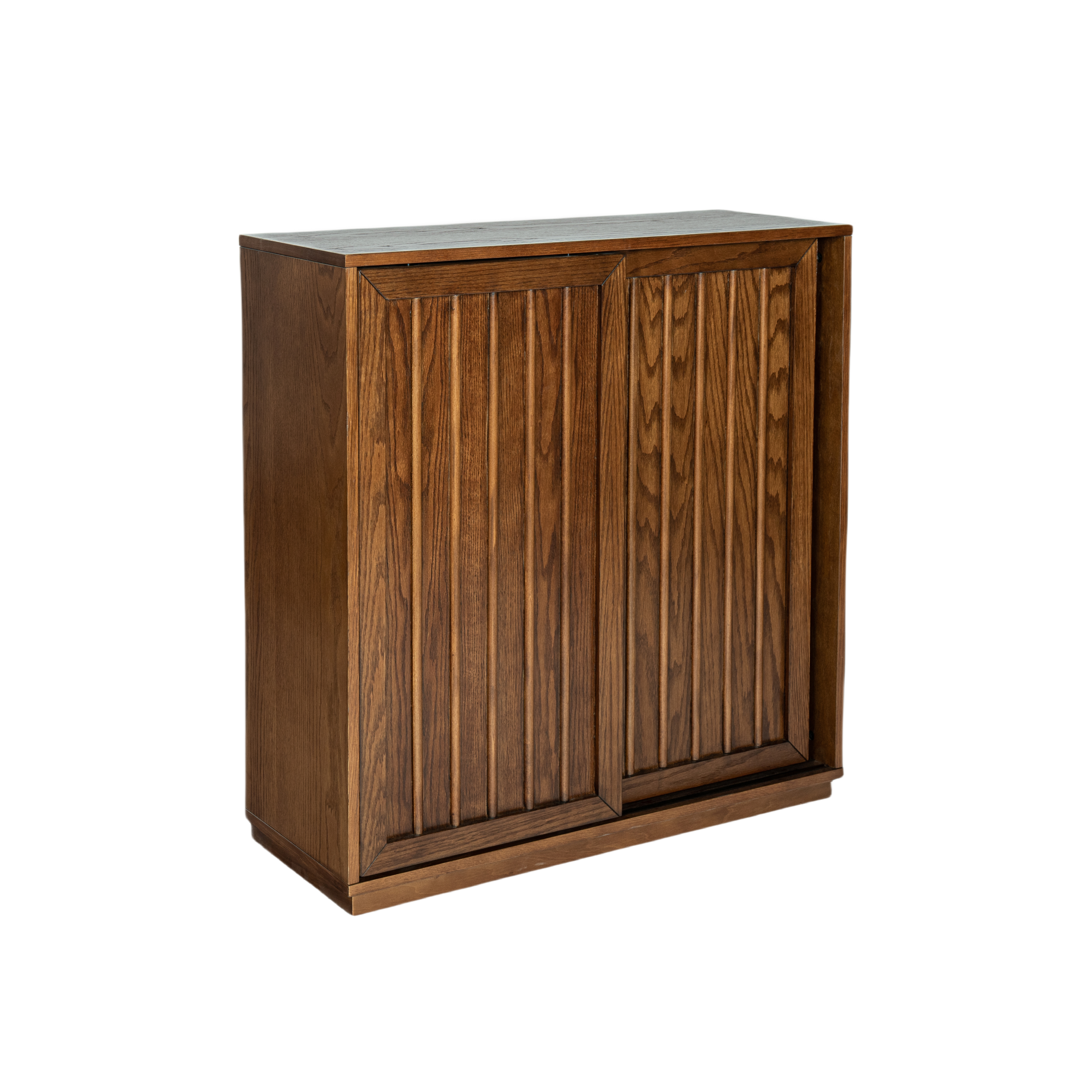 Walnut storage cabinet photographed in a styled interior setting