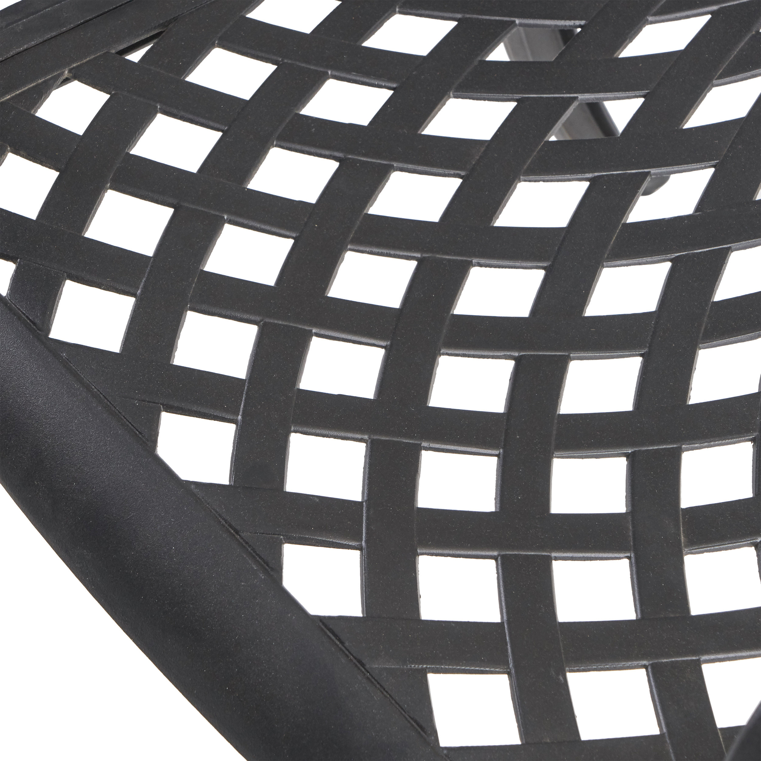 Close-up of woven lattice seat and backrest in matte black