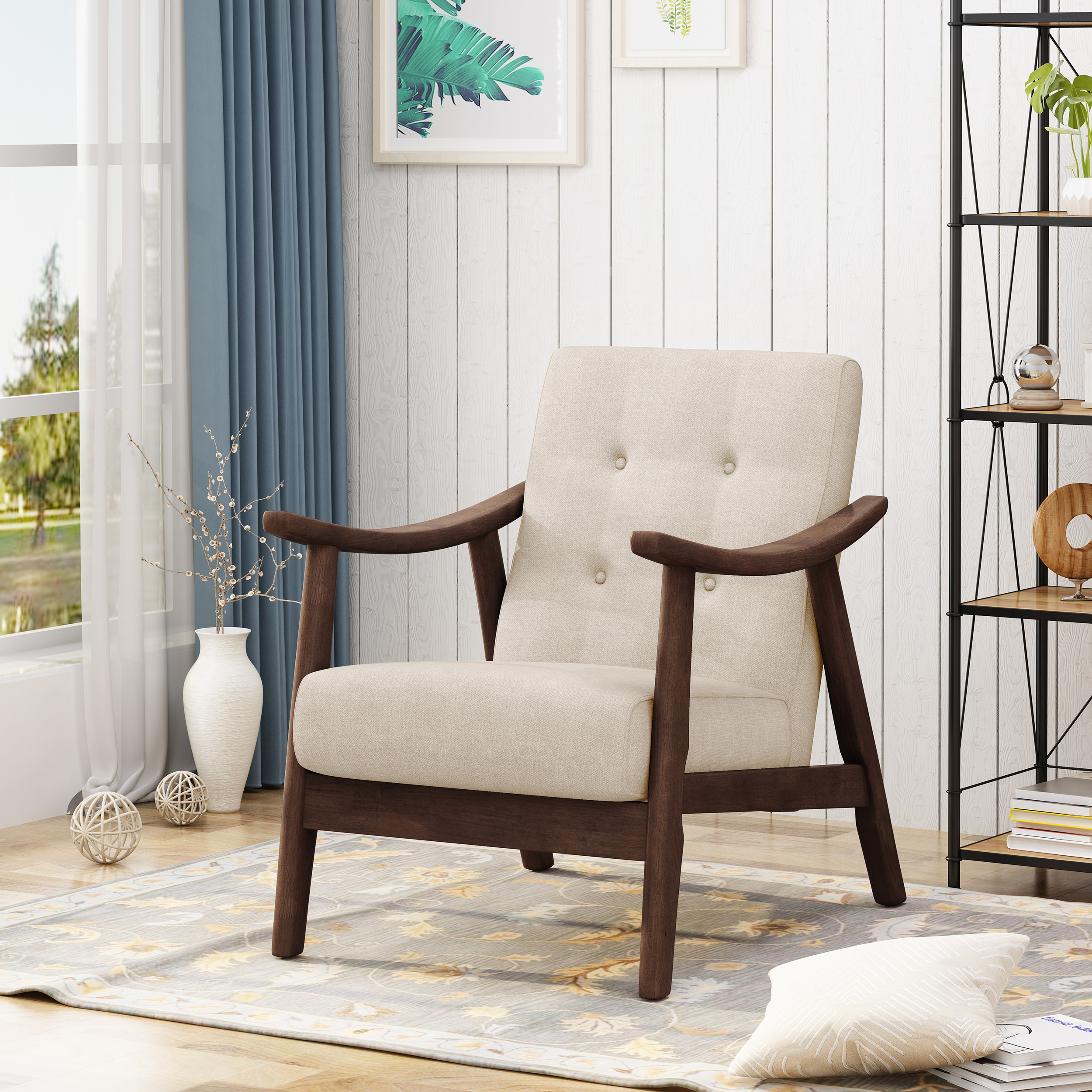 Tufted armchair beside a lamp in a bright reading nook