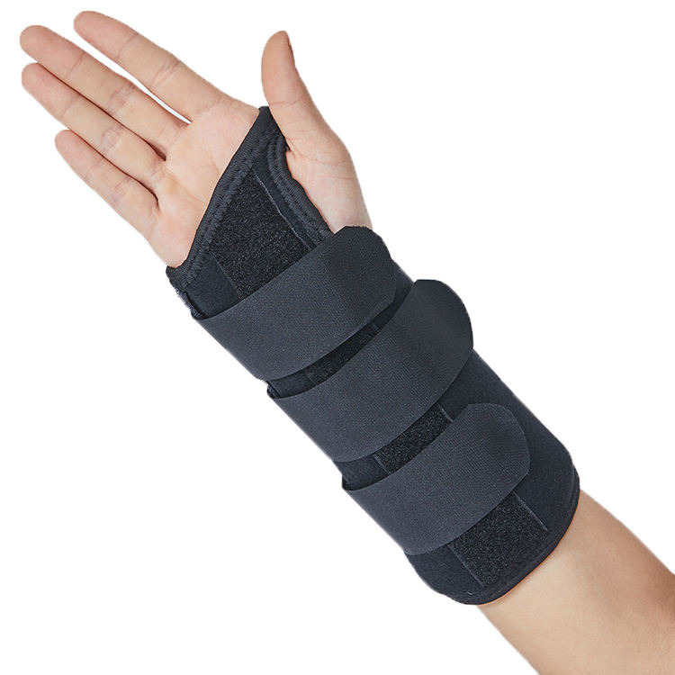 Palm‑side view of worn brace highlighting breathable mesh panels and velcro strap placement