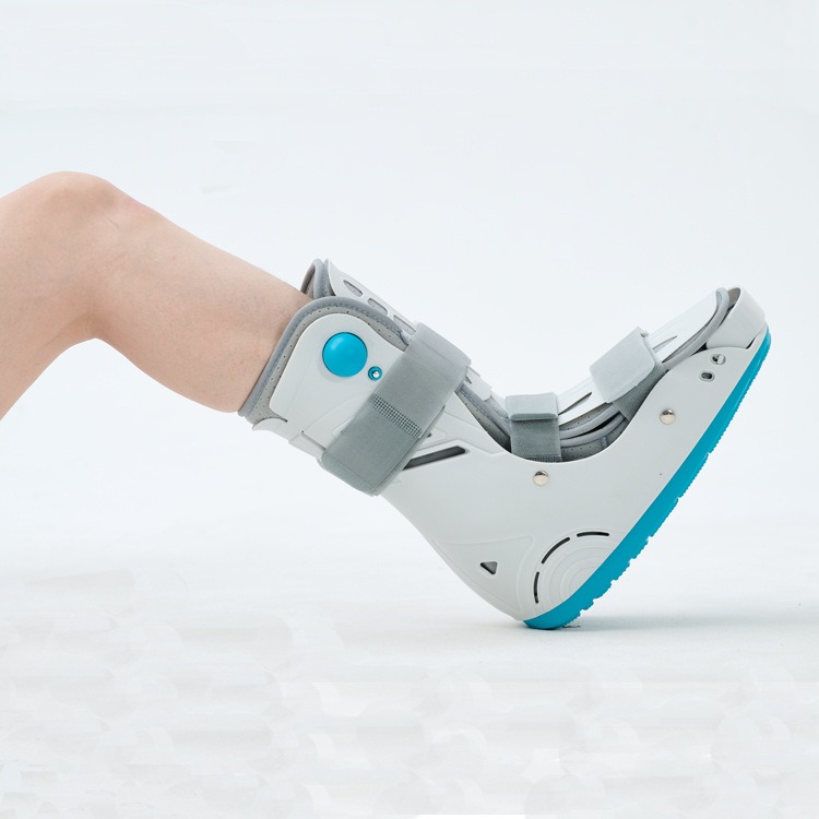 Boot in mid-step with heel lift, demonstrating rocker sole motion