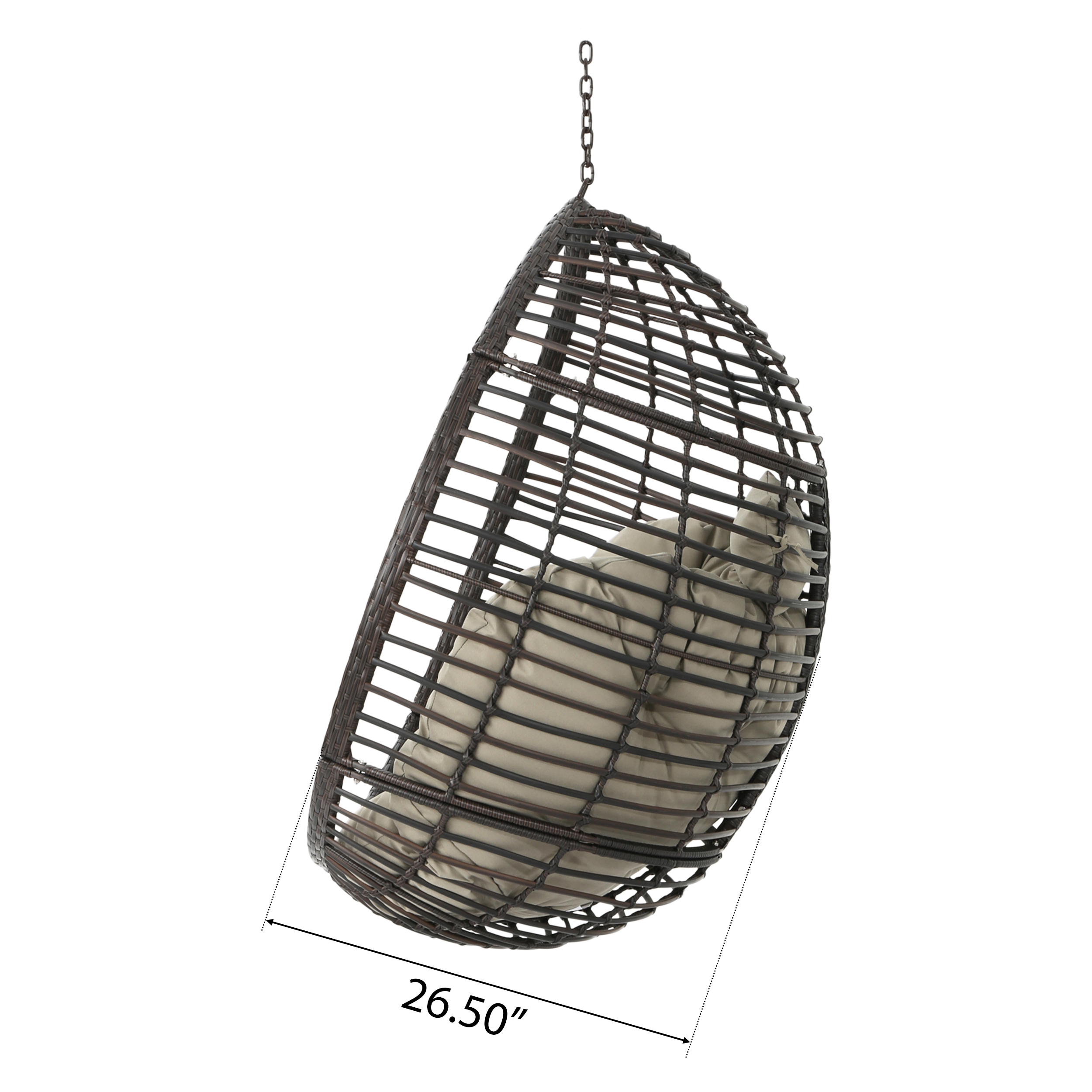 Hanging egg chair with a cushion on a sunny patio in the afternoon
