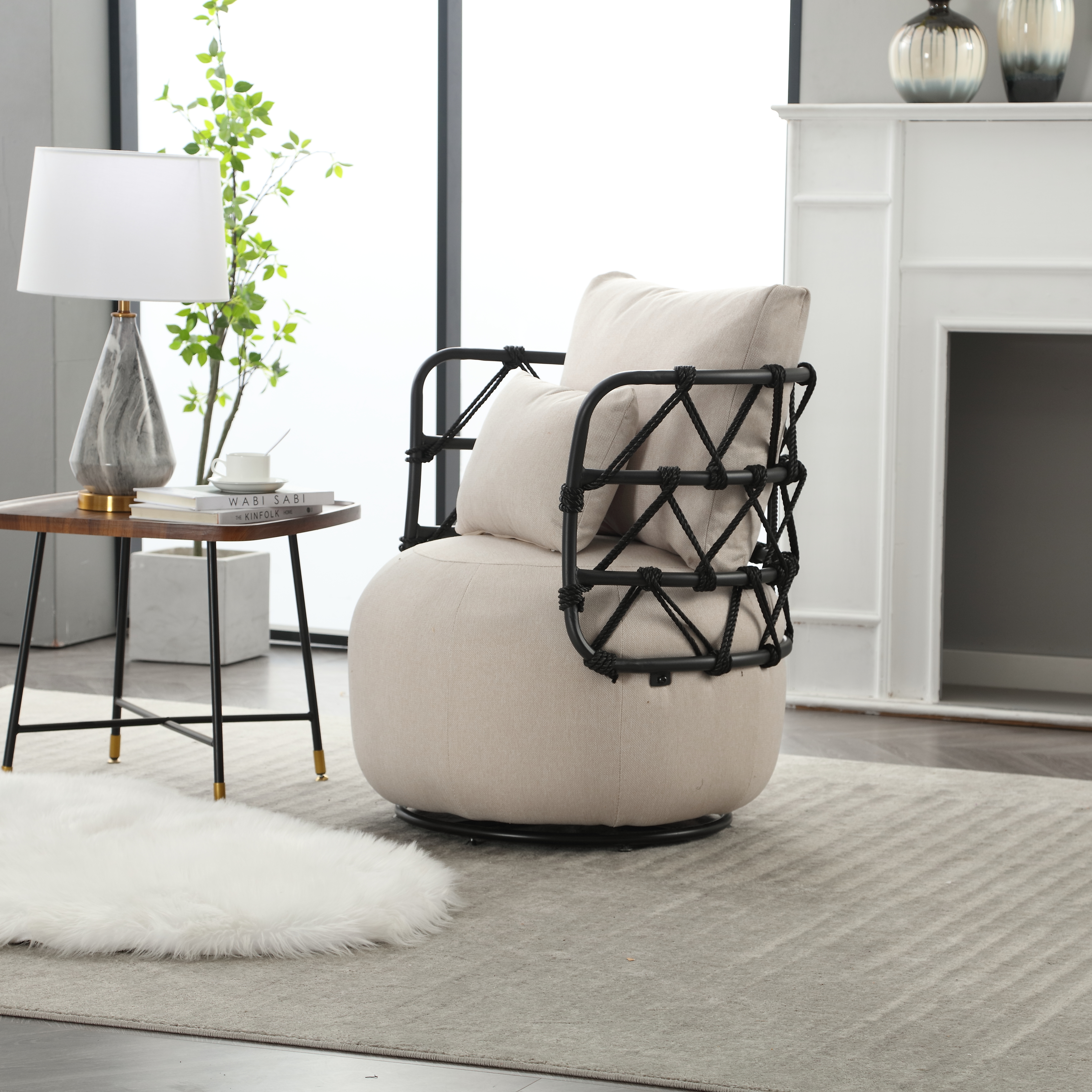 Cream accent chair beside a wooden side table and fireplace