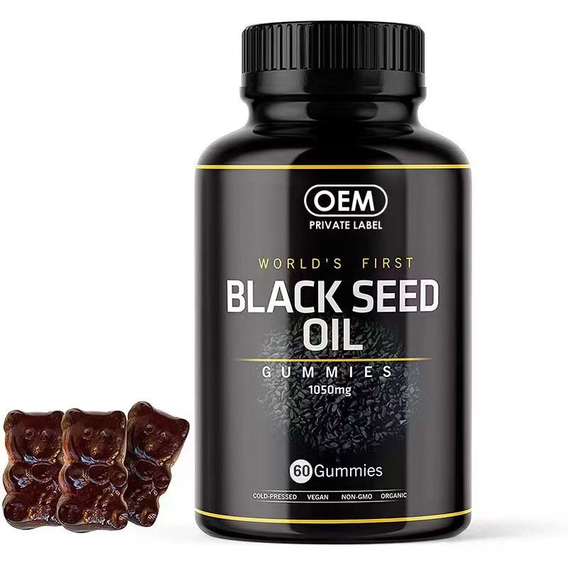 Black Seed Oil Gummies bottle displayed on pale celadon ceramic with soft peach accents