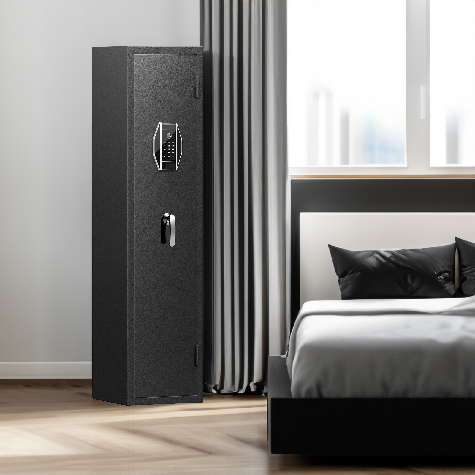 Black tall gun safe with fingerprint keypad and chrome handle beside a bed