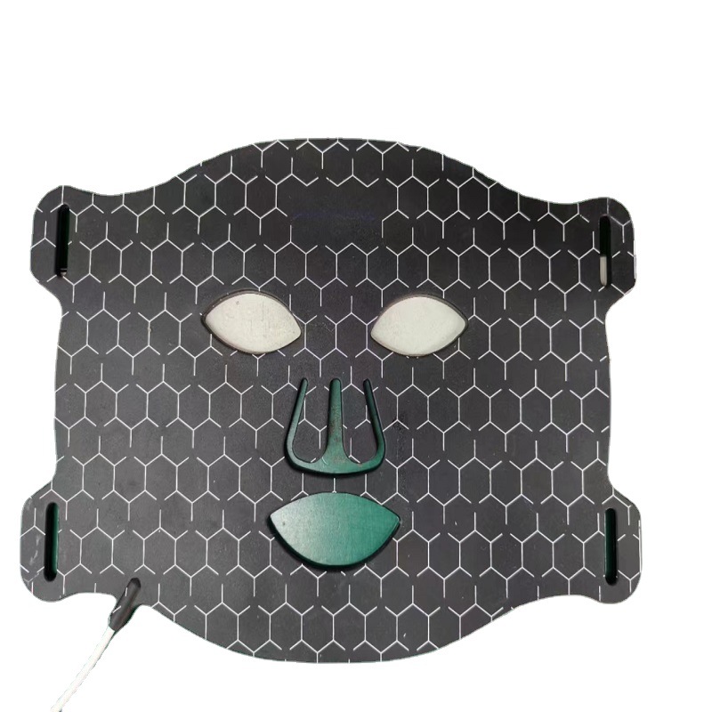 Close view of a black silicone mask with honeycomb pattern
